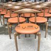 Ghế ăn gỗ sồi tự nhiên mặt nệm đầu bò Bull chân chéo GHEMN-07SN